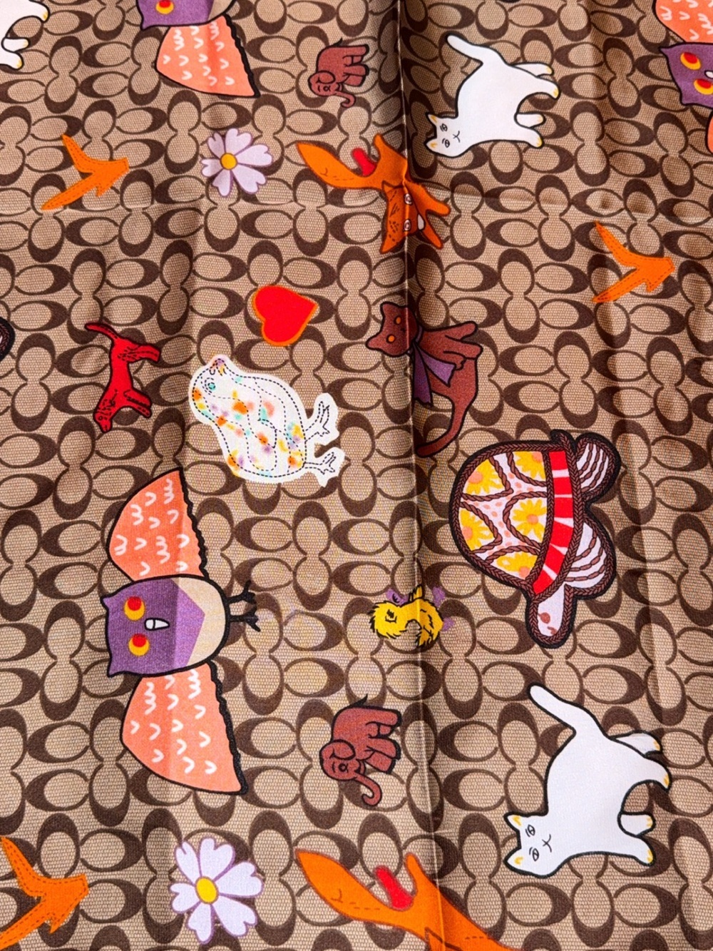 Brown Patterned Silk-Feel Headscarf with Orange Accents - Picture 8 of 11